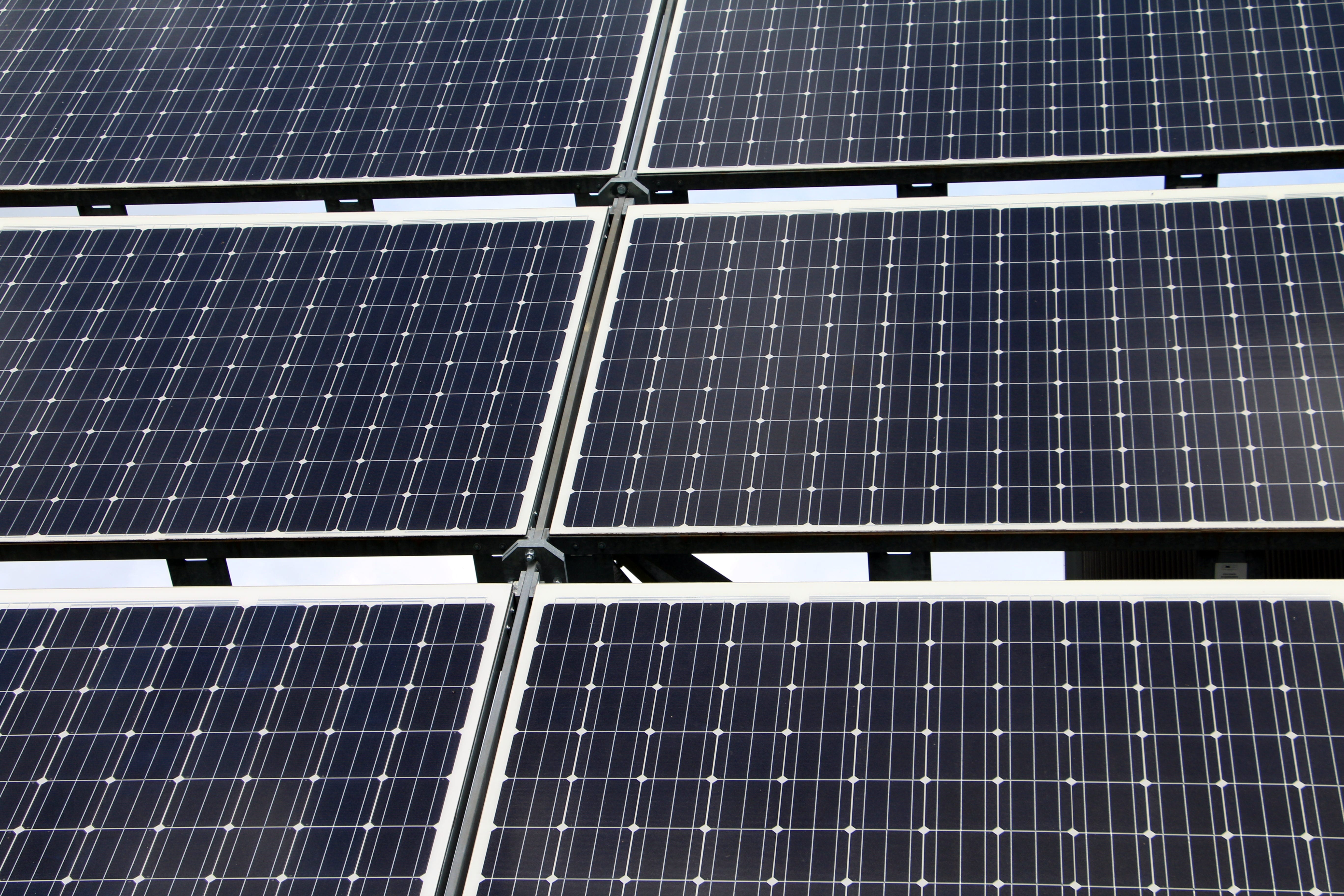 photo of a row of large solar panels