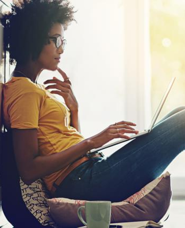 photo of a woman using a laptop computer