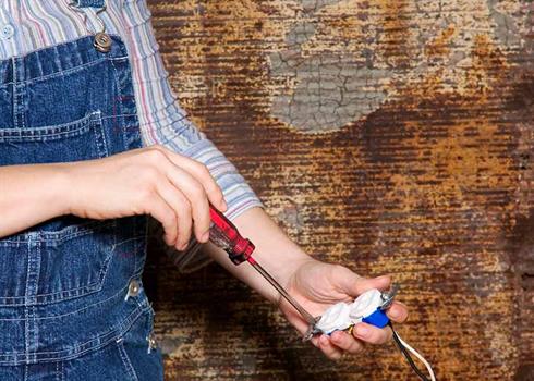 Image of an electrical inspection being carried out on a power plug