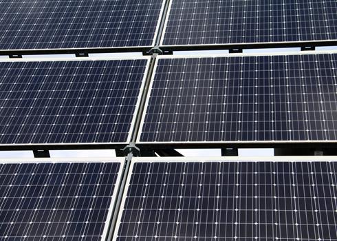 photo of a row of large solar panels