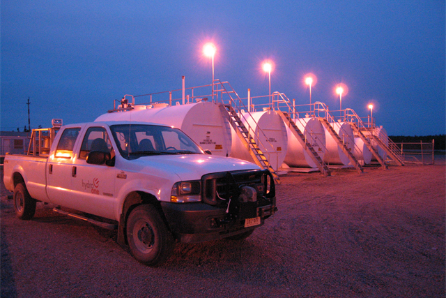 photo of a Hydro One truck in front of an Indigenous-owned business