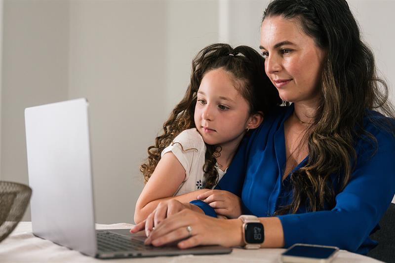 Mother and child on a laptop