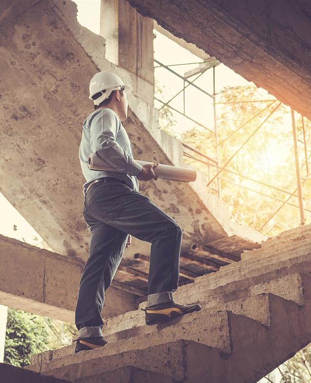 Builder working on construction site