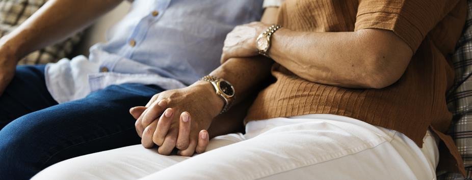 Photo of a couple holding hands