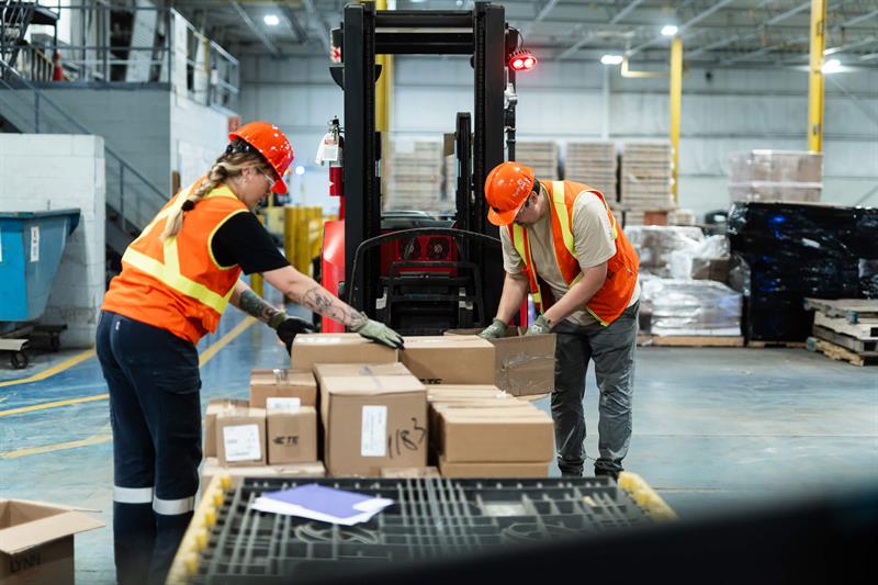 Technicians working on industrial equipment