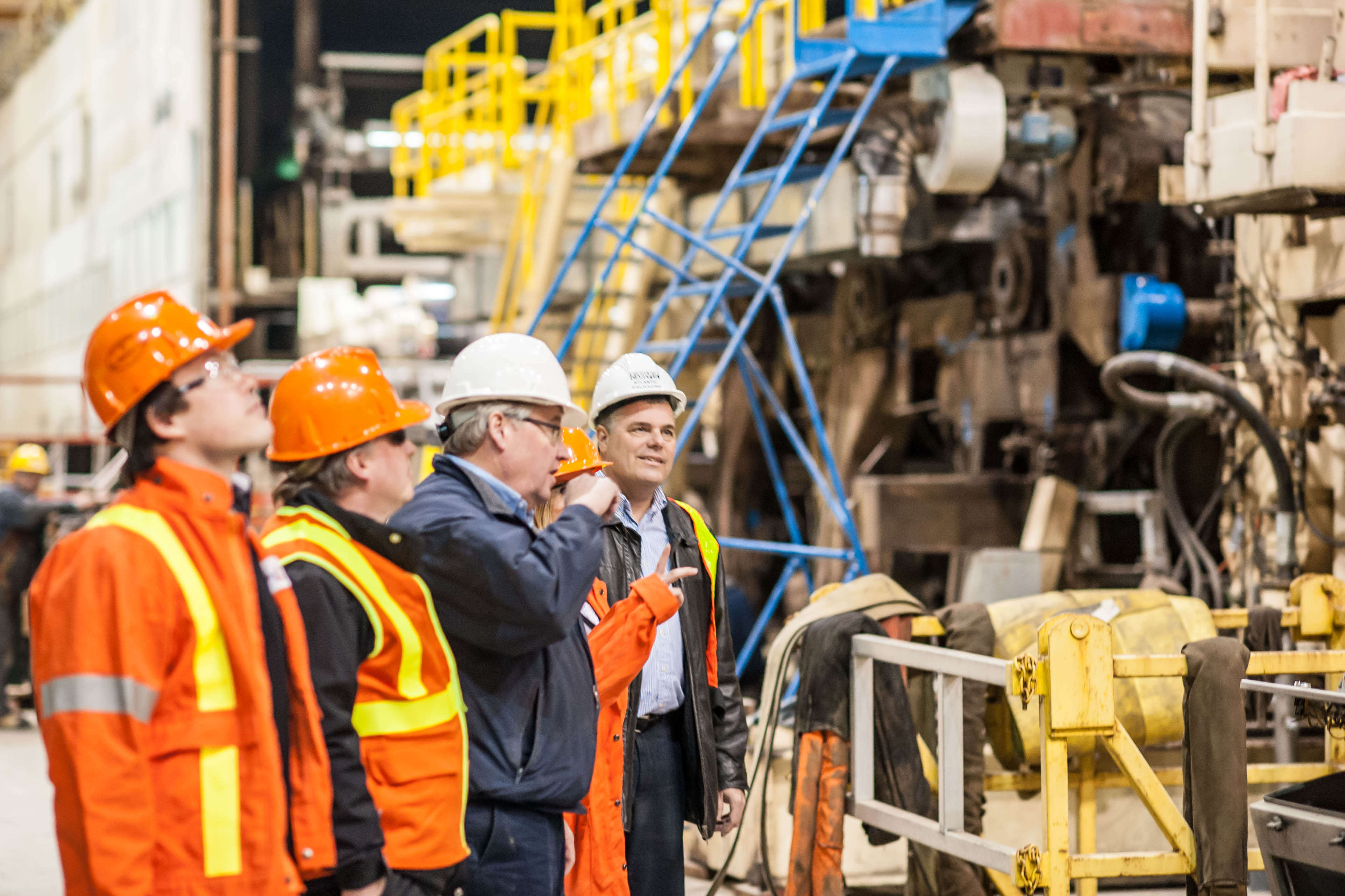 Hydro One representatives visiting a commercial warehouse