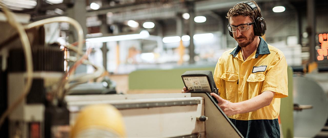 Technicians working on industrial equipment
