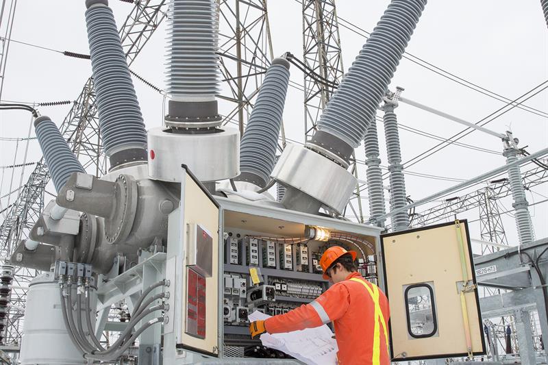 Photo of a Hydro One worker at Hawthorne Transmission Station