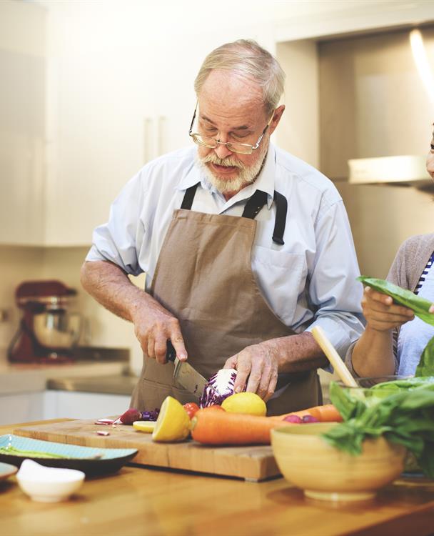 photo of a family cooking in the kitchen