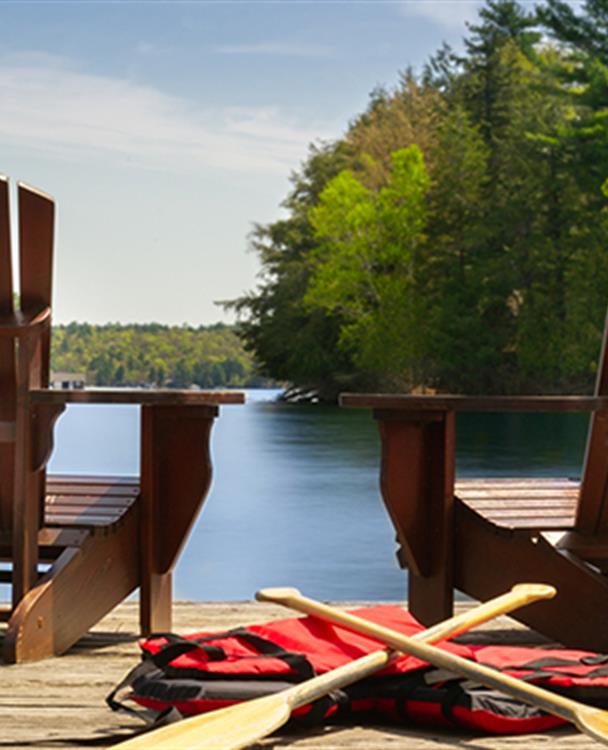 photo of a two chairs on a deck