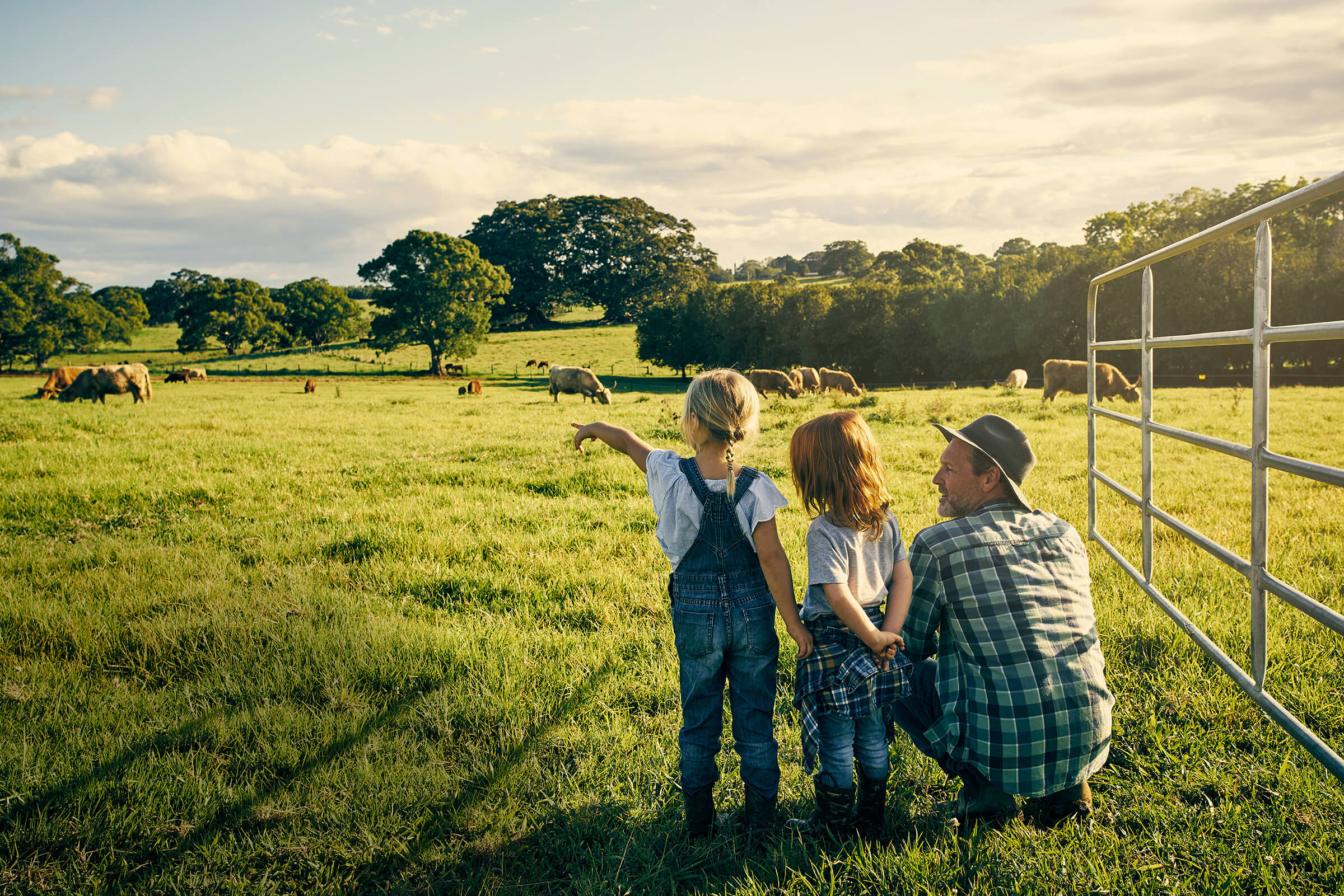 Photo of a family in their farm field