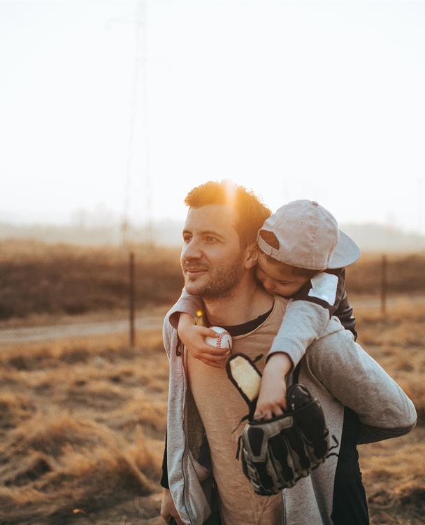 Photo of a Hydro One worker with a child