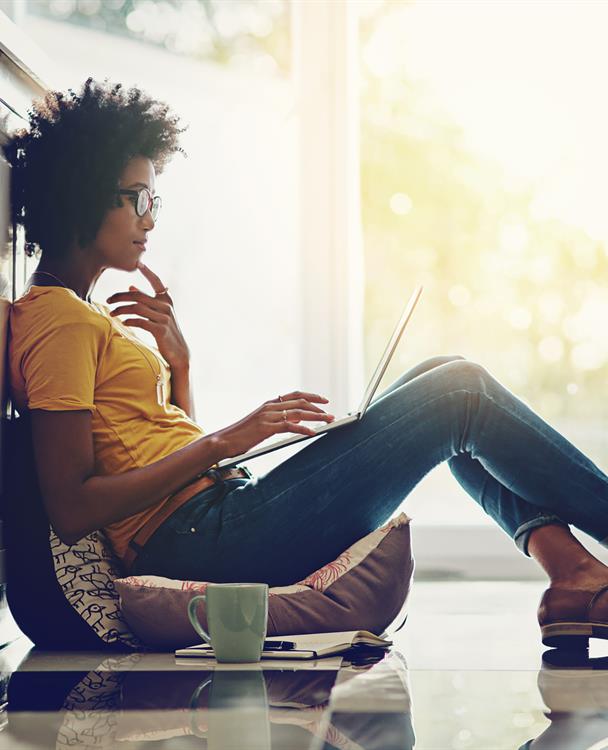 photo of a woman using her laptop computer