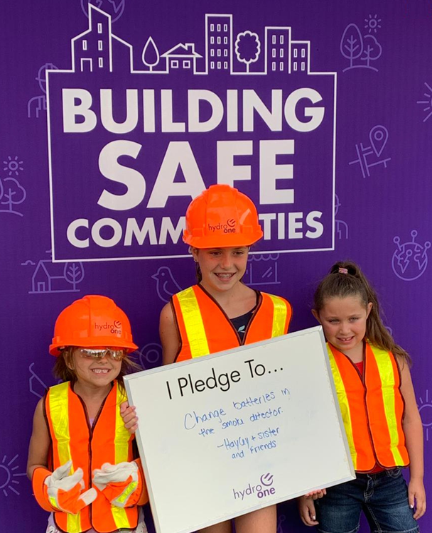 photo of kids dressed in safety gear at The Power Challenge exhibit