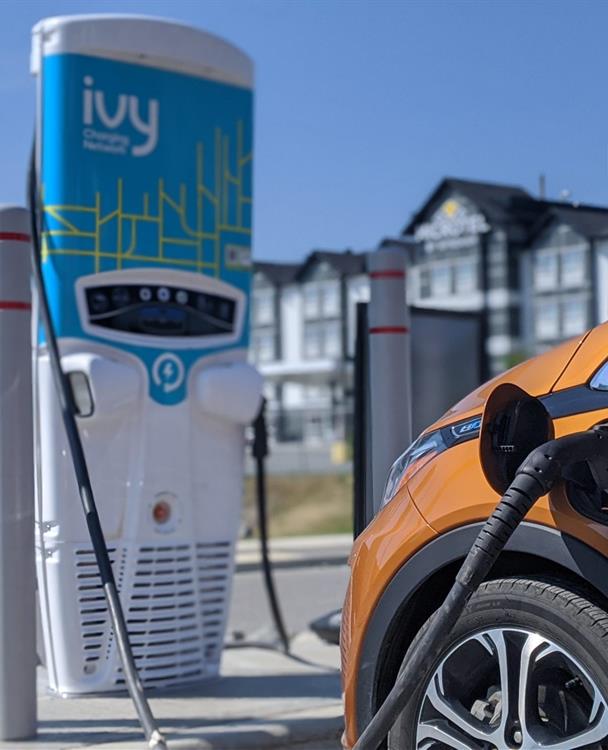 photo of an electric car charging at an Ivy Station in Ontario