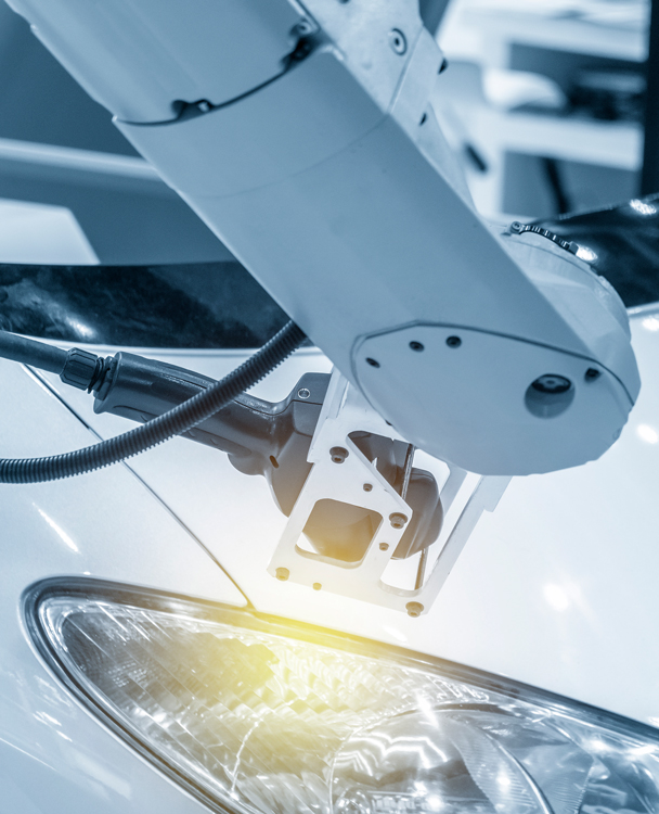 a car being manufactured in a plant