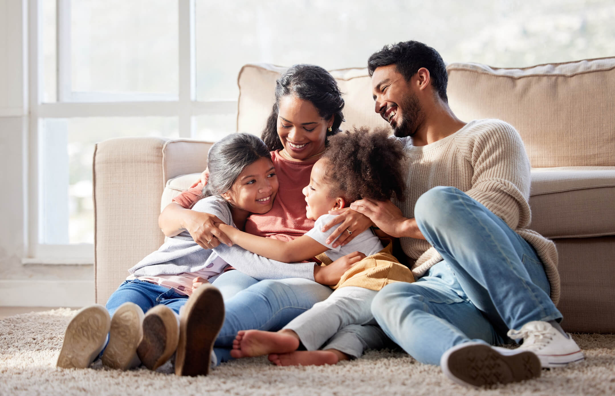 Family sitting together on the couch