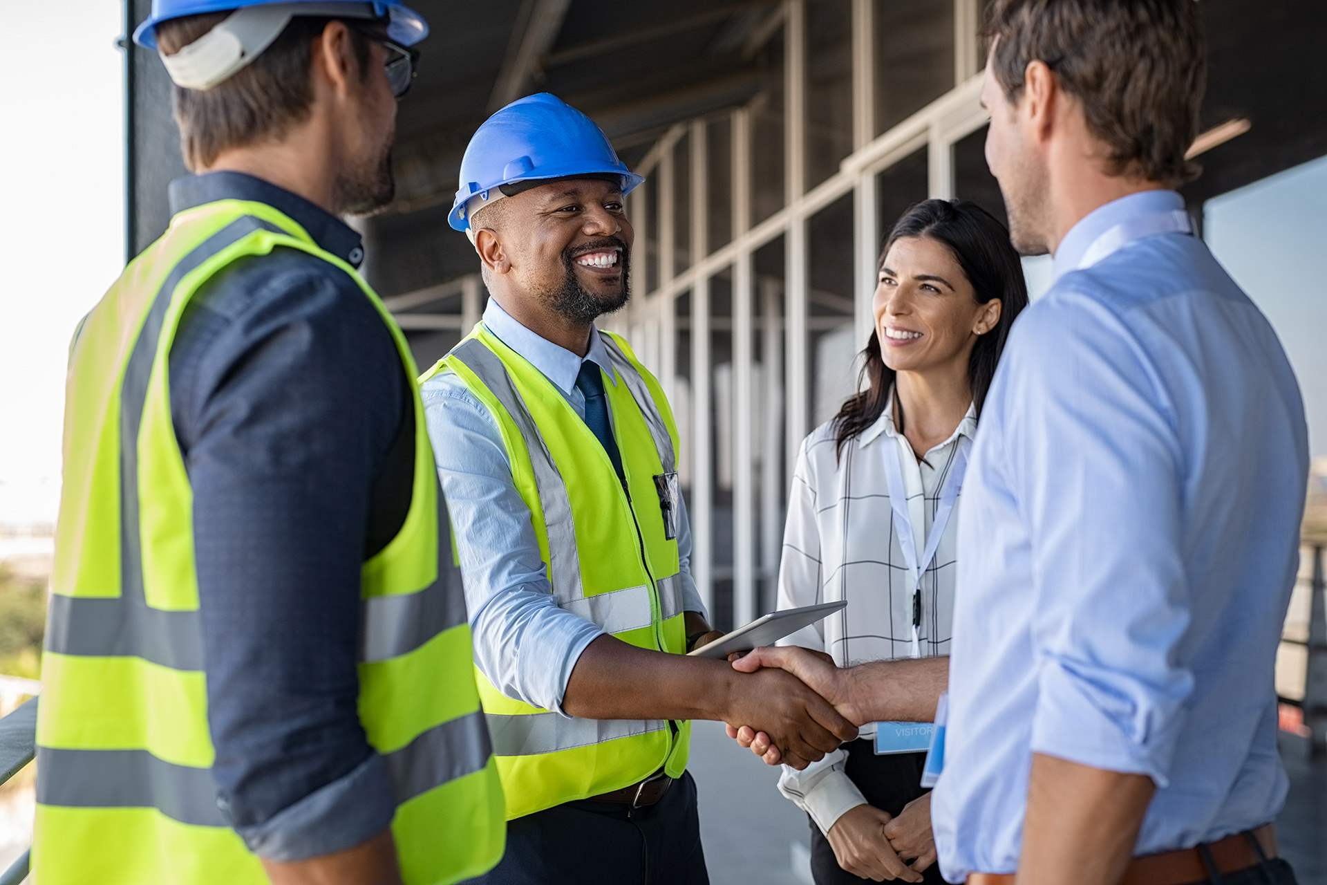 People talking and shaking hands