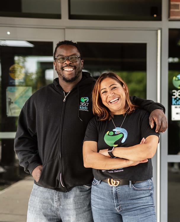 two workers from 360° kids stand outside of their facility in York Region