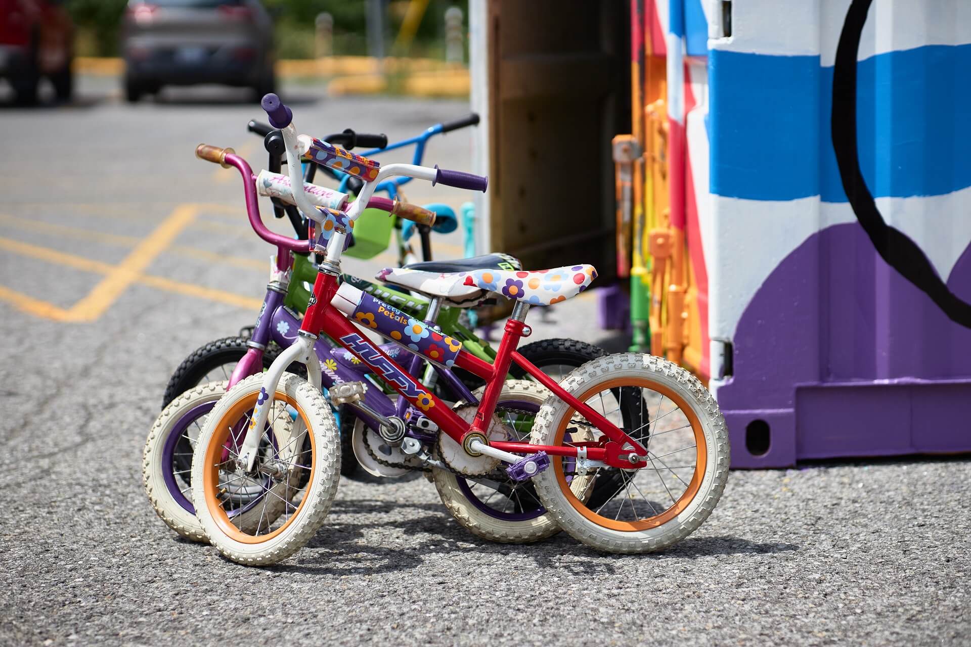 A group of old children's bikes.