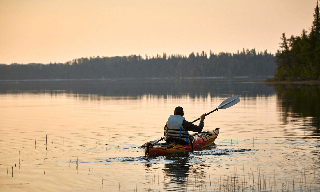 photo of person kayaking