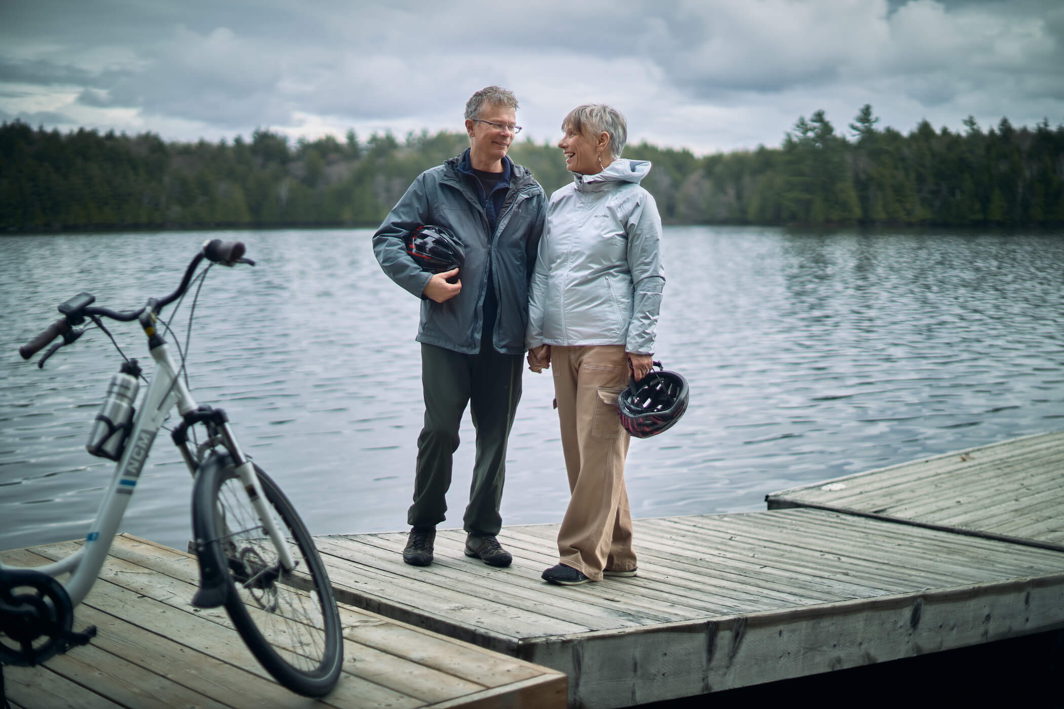 photo of two people on a dock in Muskoka