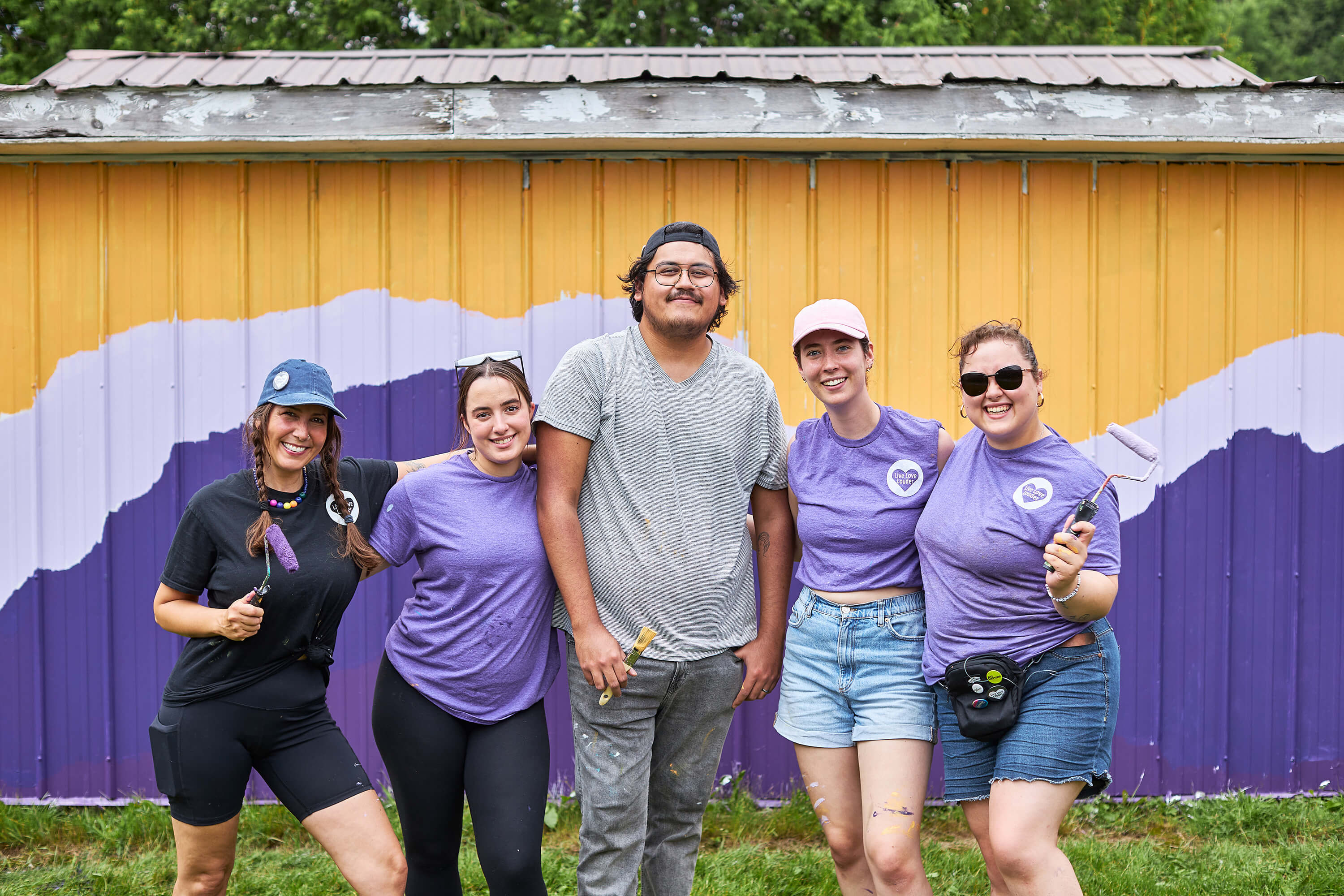 photo of volunteers in Sudbury painting a mural