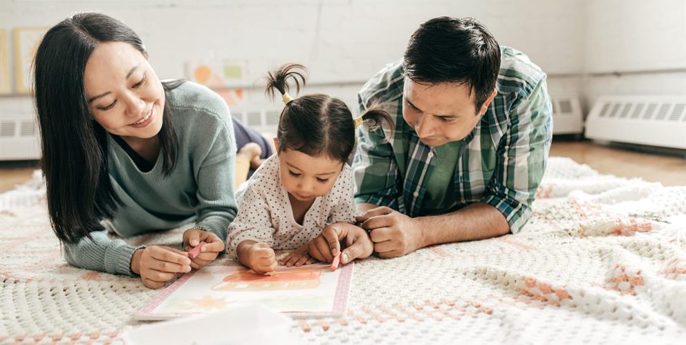 Photo of a family with baseboard heating