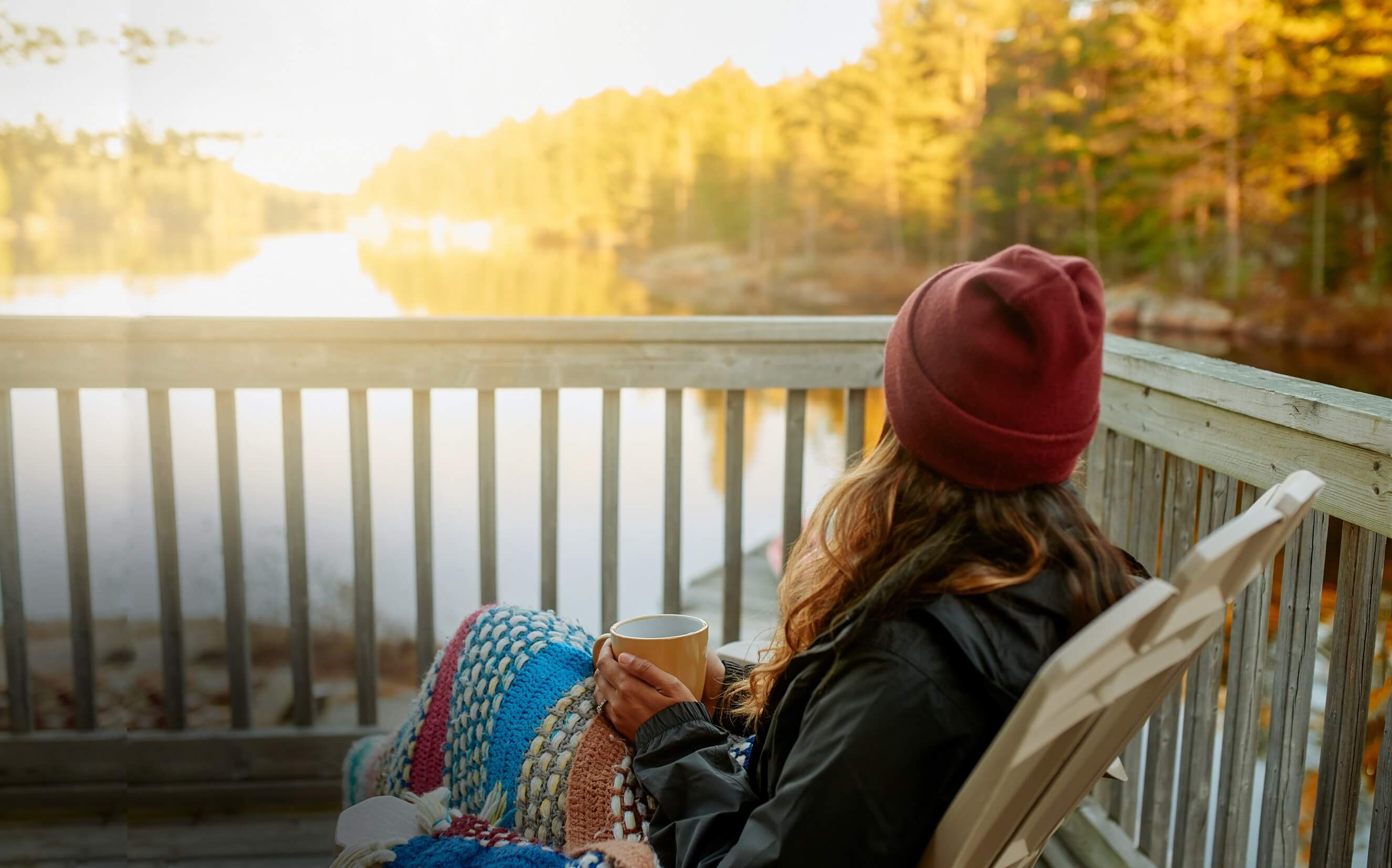 Woman sitting on deck