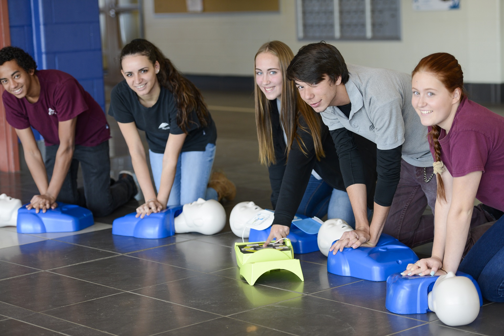 Students practicing CPR.