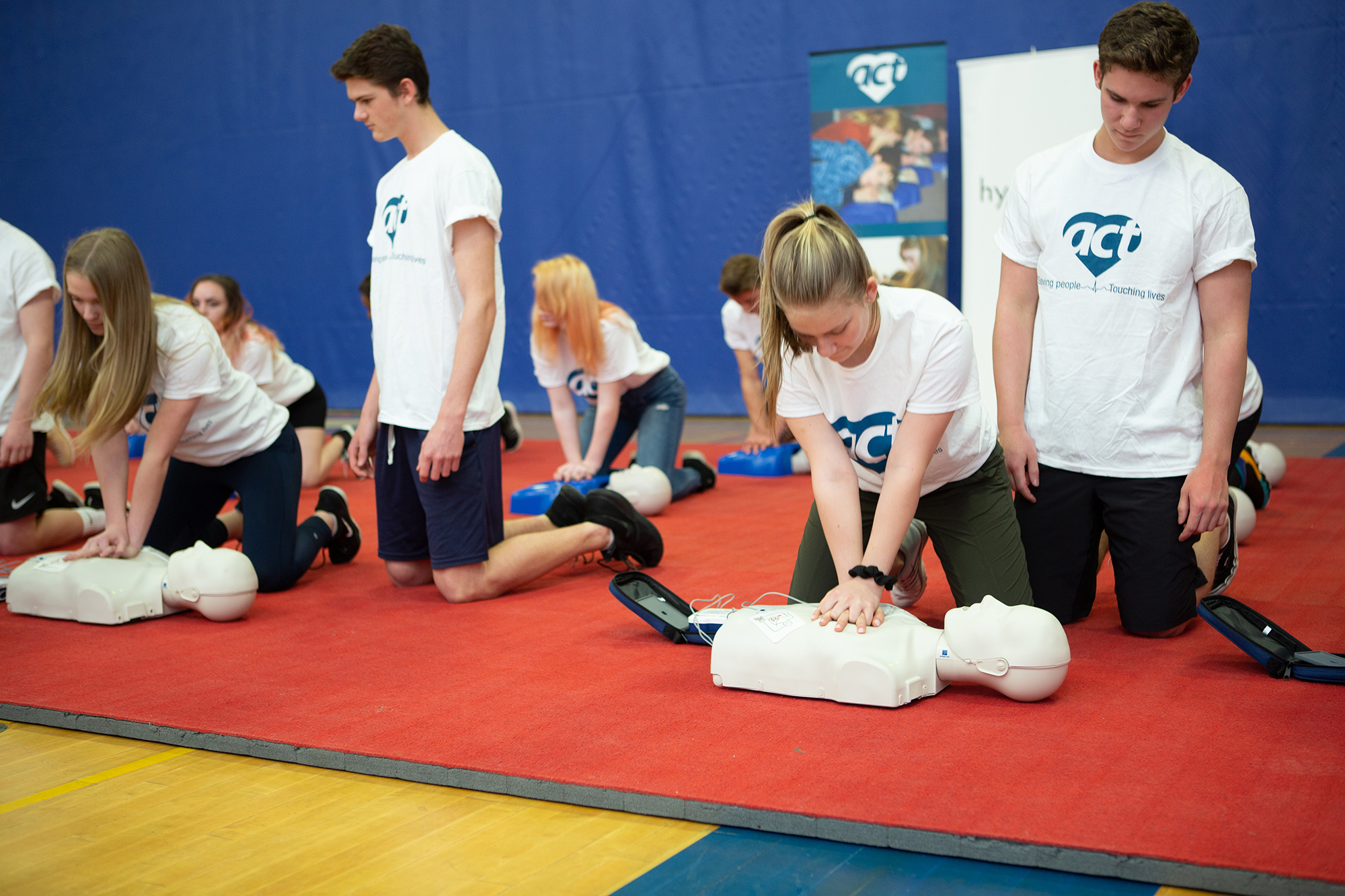 Students practicing CPR.