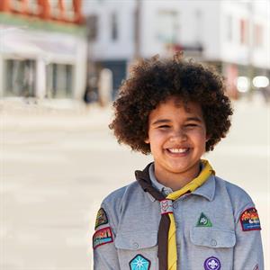 an outdoor scene promoting Scouts Canada