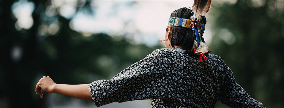 Photo of a First Nations member in traditional clothing