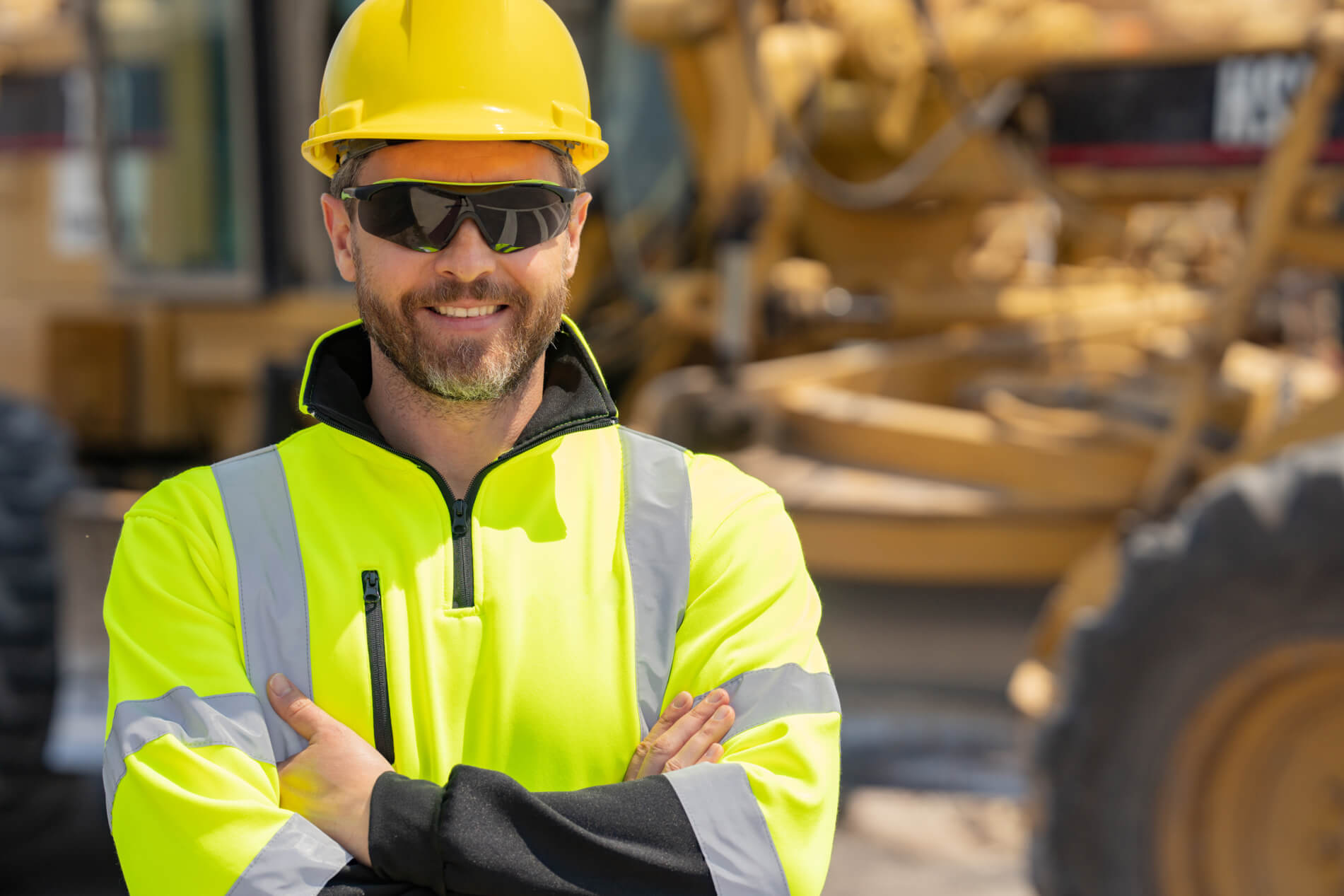 constructon worker crossing their arms