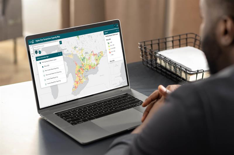 photo of a person using the Generation Capacity Map on their laptop