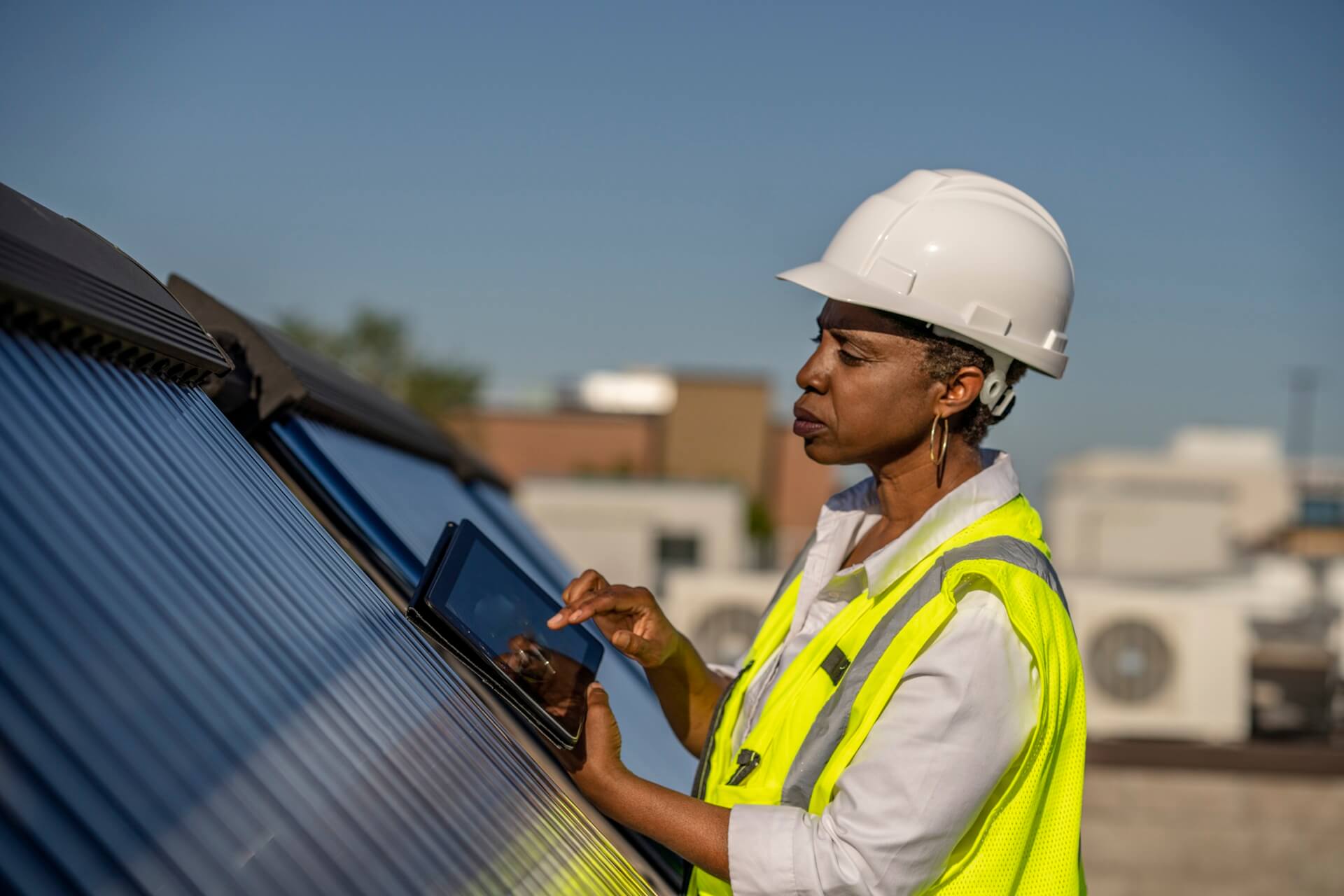 photo of a woman in a hard hat