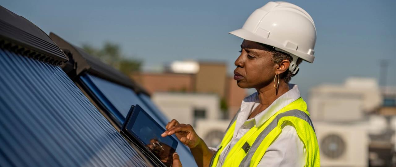 Photo of a woman in a hard hat