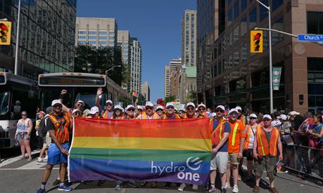 Hydro One employees at a Pride parade
