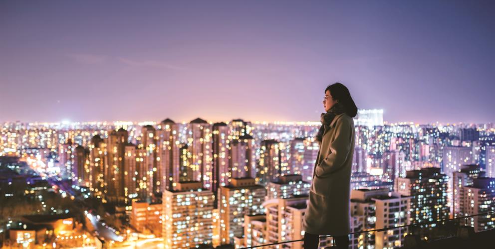 photo of a city skyline at night