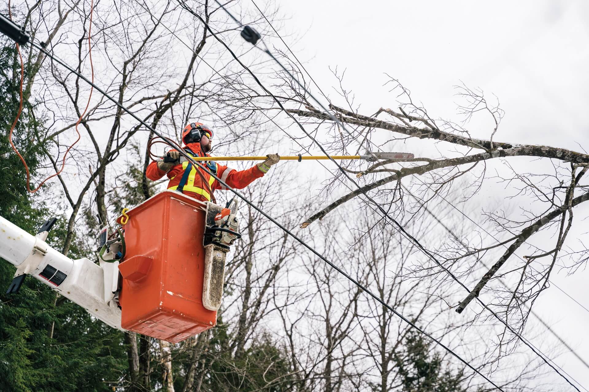 Hydro one worker working on a power line