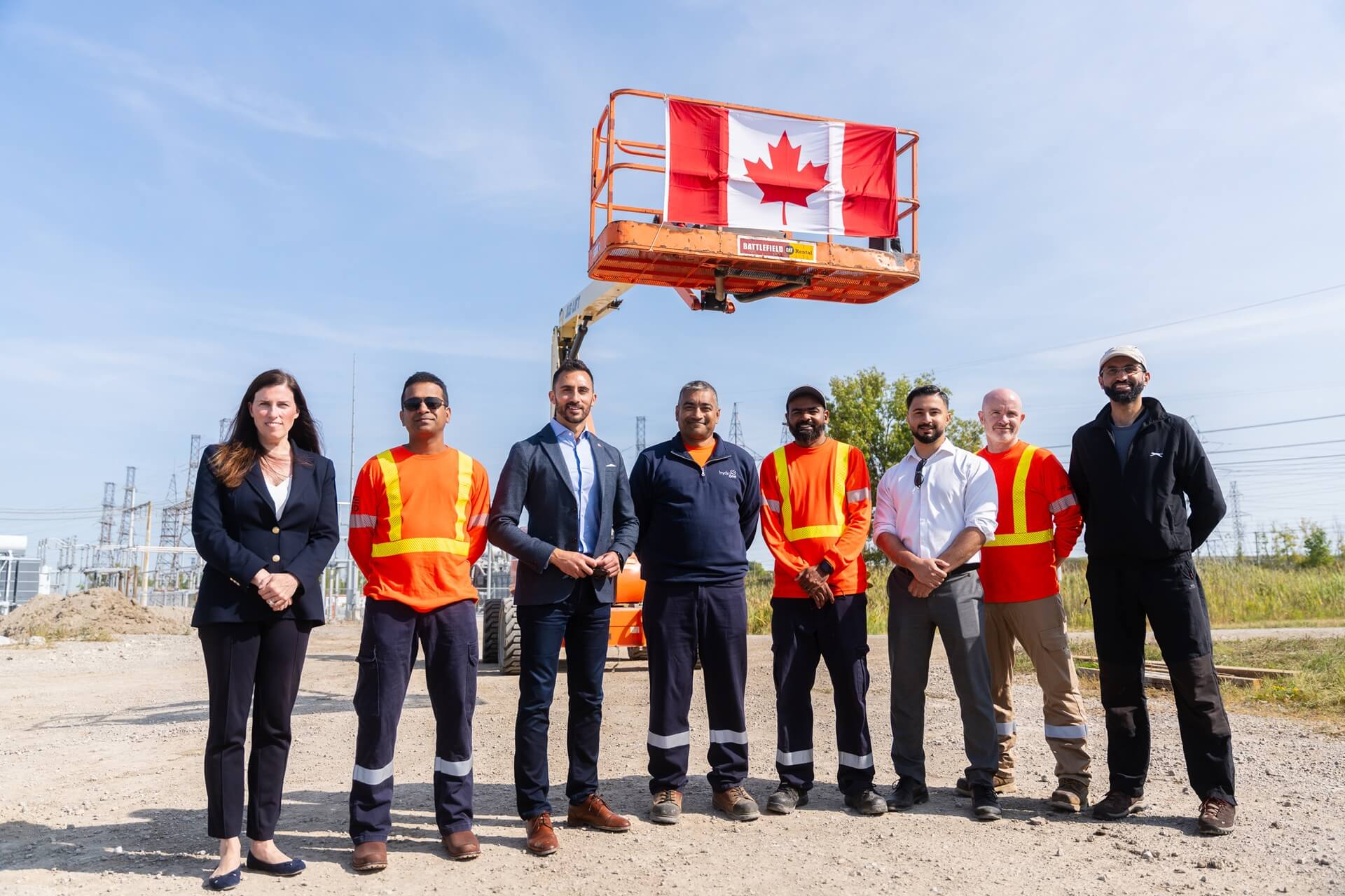 Hydro one employees standing together