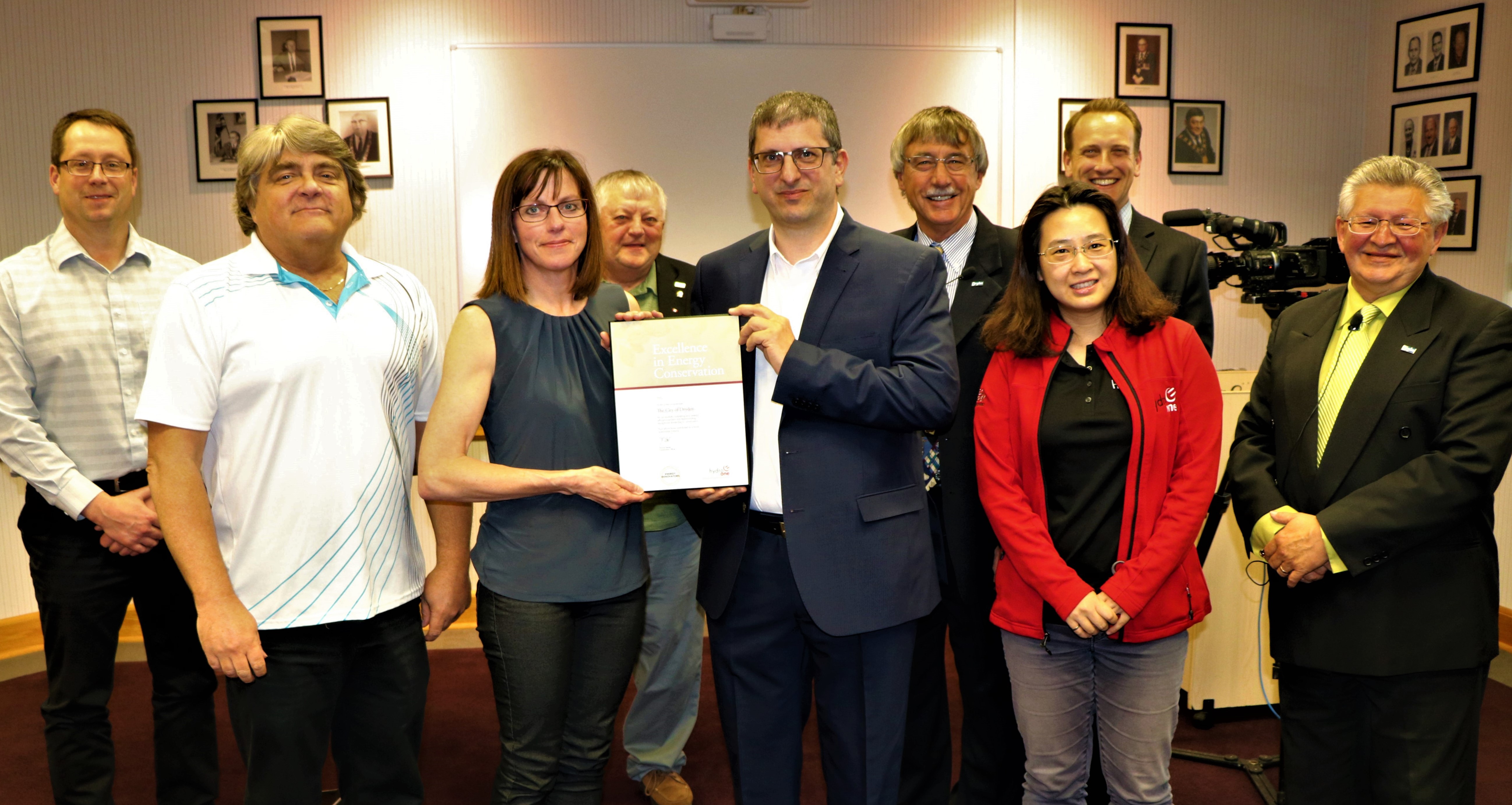 photo of City of Dryden representatives receiving an Energy Innovator plaque