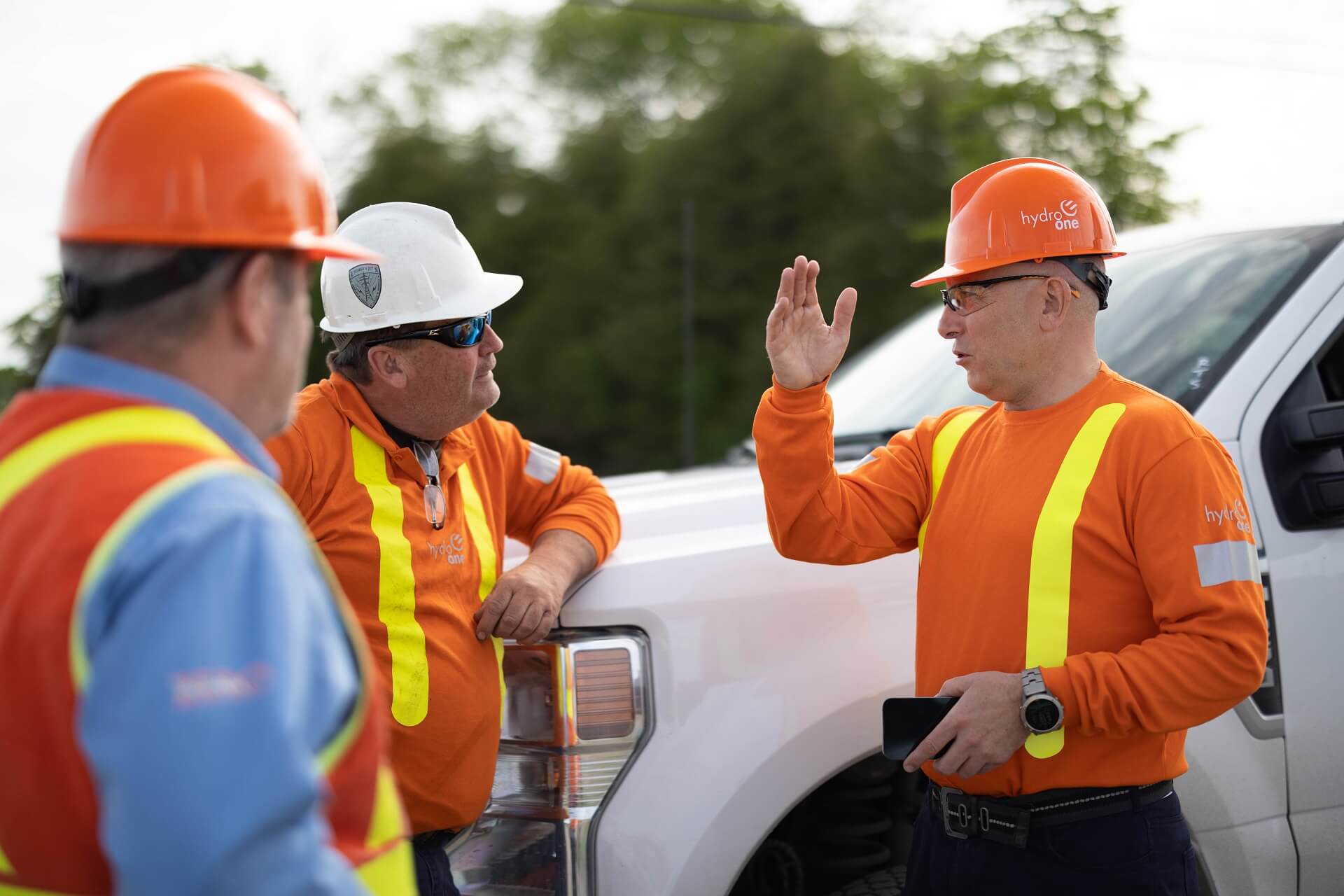 Jason Fitzimmons meets with crew members.