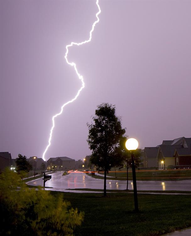 Photo of a lightning strike in a residental neighbourhood