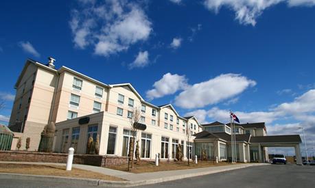 A commercial building exterior on a sunny day