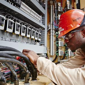 Hydro One technician working on a project