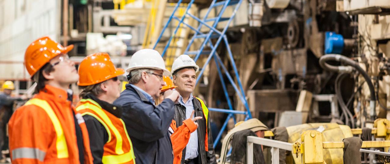 photo of a group of Hydro One representatives visiting a large commercial business