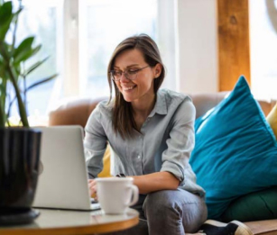 person sitting on their couch