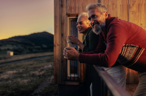 couple watching sunset from dock