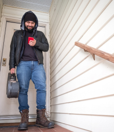 image of a man on his cell phone